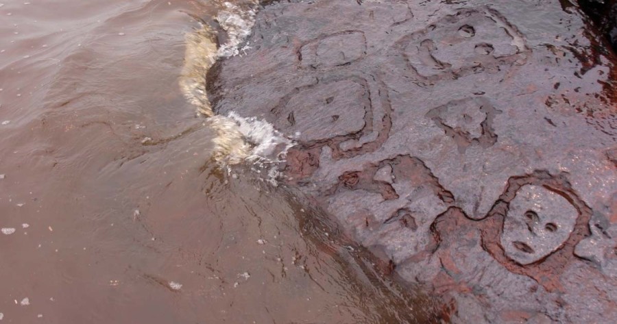 As Brazil’s Drought Exposes a Riverbed, Ancient Petroglyphs (1,000-2,000 Years Old) Surface Near Manaus, Hinting at Extraterrestrial Traces